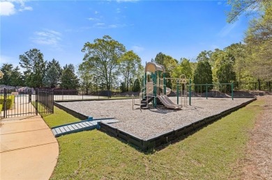 Welcome to luxury living in the prestigious gated Crystal Lake on Crystal Lake Golf and Country Club in Georgia - for sale on GolfHomes.com, golf home, golf lot