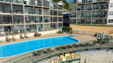 The best value for condo living! Come see the BIG lake views on The Club At Old Kinderhook in Missouri - for sale on GolfHomes.com, golf home, golf lot