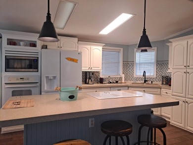 This is A Palm Harbor Double Wide! 1500 SqFt. Absolutely on Riverwood Golf Club in Florida - for sale on GolfHomes.com, golf home, golf lot
