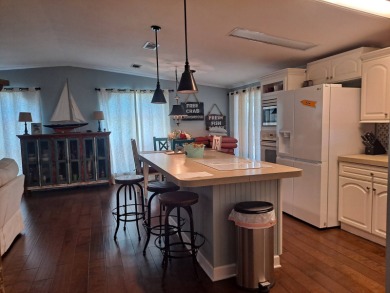 This is A Palm Harbor Double Wide! 1500 SqFt. Absolutely on Riverwood Golf Club in Florida - for sale on GolfHomes.com, golf home, golf lot