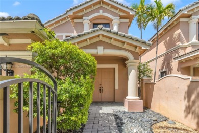 Spacious Coach Home with Golf Course Views in Weston Hills on Weston Hills Country Club in Florida - for sale on GolfHomes.com, golf home, golf lot
