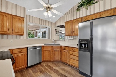 Welcome to this FANTASTIC, TURNKEY 2/2 CUSTOM DESIGNER with on El Diablo Executive Golf Course in Florida - for sale on GolfHomes.com, golf home, golf lot