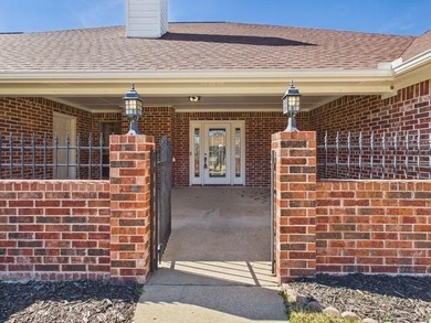 This exceptionally-updated 3 bedroom, 3 bathroom brick home in on Cedar Creek Country Club in Texas - for sale on GolfHomes.com, golf home, golf lot