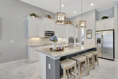 Experience refined living in this beautifully upgraded PGA on PGA Golf Club in PGA Village in Florida - for sale on GolfHomes.com, golf home, golf lot