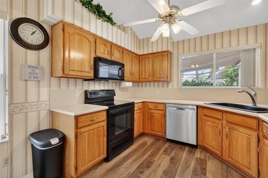 Welcome to this FANTASTIC, TURNKEY 2/2 CUSTOM DESIGNER with on El Diablo Executive Golf Course in Florida - for sale on GolfHomes.com, golf home, golf lot