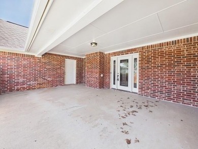 This exceptionally-updated 3 bedroom, 3 bathroom brick home in on Cedar Creek Country Club in Texas - for sale on GolfHomes.com, golf home, golf lot