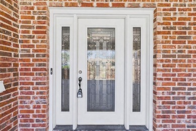 This exceptionally-updated 3 bedroom, 3 bathroom brick home in on Cedar Creek Country Club in Texas - for sale on GolfHomes.com, golf home, golf lot