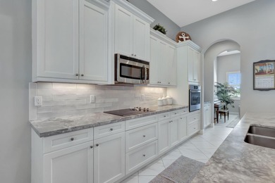 Experience refined living in this beautifully upgraded PGA on PGA Golf Club in PGA Village in Florida - for sale on GolfHomes.com, golf home, golf lot