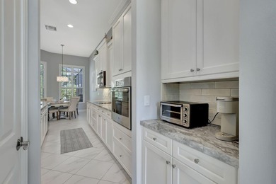 Experience refined living in this beautifully upgraded PGA on PGA Golf Club in PGA Village in Florida - for sale on GolfHomes.com, golf home, golf lot