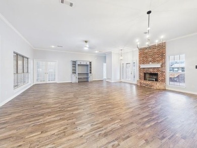 This exceptionally-updated 3 bedroom, 3 bathroom brick home in on Cedar Creek Country Club in Texas - for sale on GolfHomes.com, golf home, golf lot