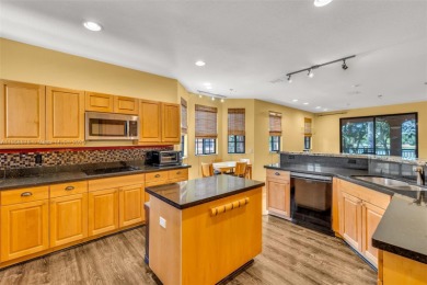 Spacious Coach Home with Golf Course Views in Weston Hills on Weston Hills Country Club in Florida - for sale on GolfHomes.com, golf home, golf lot