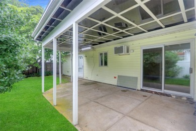 Welcome to this timeless 5-bedroom, 2.5-bath colonial brimming on Middle Bay Country Club in New York - for sale on GolfHomes.com, golf home, golf lot