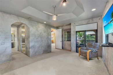 Spacious Coach Home with Golf Course Views in Weston Hills on Weston Hills Country Club in Florida - for sale on GolfHomes.com, golf home, golf lot