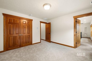 Timeless luxury with incredible views on ~1 acre of resort-like on Quail Hollow Golf Club in Idaho - for sale on GolfHomes.com, golf home, golf lot