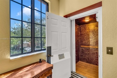 Spacious Coach Home with Golf Course Views in Weston Hills on Weston Hills Country Club in Florida - for sale on GolfHomes.com, golf home, golf lot