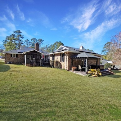 This 2,674 sq ft ranch-style brick home in the gated Santee on Santee-Cooper Country Club in South Carolina - for sale on GolfHomes.com, golf home, golf lot