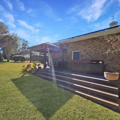 This 2,674 sq ft ranch-style brick home in the gated Santee on Santee-Cooper Country Club in South Carolina - for sale on GolfHomes.com, golf home, golf lot