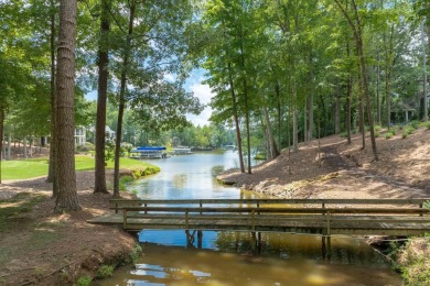 Spacious Lake Access Home with Golf View/Cove View in Reynolds on Reynolds Lake Oconee - The Oconee in Georgia - for sale on GolfHomes.com, golf home, golf lot