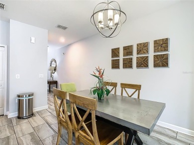 Discover this stunning 4-bedroom, 3-bathroom townhouse in the on The Oasis Club at Champions Gate in Florida - for sale on GolfHomes.com, golf home, golf lot