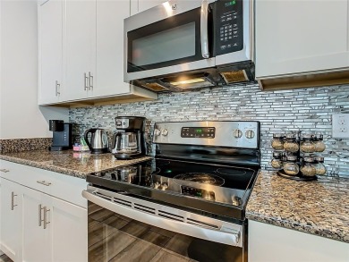 Discover this stunning 4-bedroom, 3-bathroom townhouse in the on The Oasis Club at Champions Gate in Florida - for sale on GolfHomes.com, golf home, golf lot