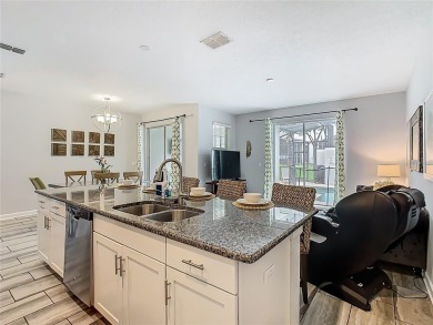 Discover this stunning 4-bedroom, 3-bathroom townhouse in the on The Oasis Club at Champions Gate in Florida - for sale on GolfHomes.com, golf home, golf lot