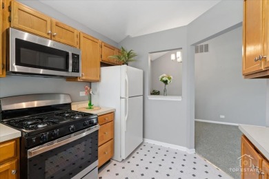 Charming Upper-Floor Townhouse with Golf Course Views! Welcome on Fox Run Golf Links in Illinois - for sale on GolfHomes.com, golf home, golf lot