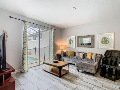 Discover this stunning 4-bedroom, 3-bathroom townhouse in the on The Oasis Club at Champions Gate in Florida - for sale on GolfHomes.com, golf home, golf lot