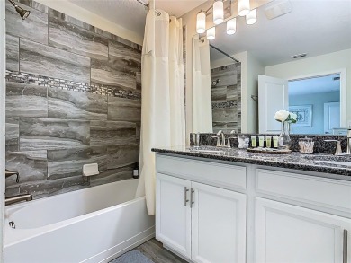 Discover this stunning 4-bedroom, 3-bathroom townhouse in the on The Oasis Club at Champions Gate in Florida - for sale on GolfHomes.com, golf home, golf lot