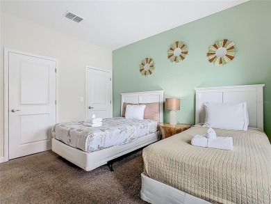 Discover this stunning 4-bedroom, 3-bathroom townhouse in the on The Oasis Club at Champions Gate in Florida - for sale on GolfHomes.com, golf home, golf lot