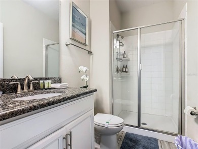 Discover this stunning 4-bedroom, 3-bathroom townhouse in the on The Oasis Club at Champions Gate in Florida - for sale on GolfHomes.com, golf home, golf lot