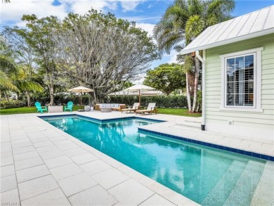 Welcome to your dream beachside escape, where classic charm on Naples Beach Hotel and Golf Club in Florida - for sale on GolfHomes.com, golf home, golf lot