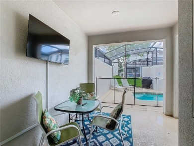 Discover this stunning 4-bedroom, 3-bathroom townhouse in the on The Oasis Club at Champions Gate in Florida - for sale on GolfHomes.com, golf home, golf lot