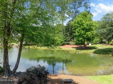 Welcome to 1006 Butler National--a beautifully appointed brick on Porters Neck Country Club in North Carolina - for sale on GolfHomes.com, golf home, golf lot