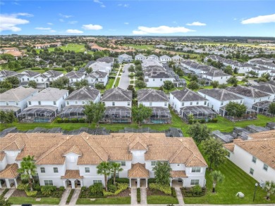 Discover this stunning 4-bedroom, 3-bathroom townhouse in the on The Oasis Club at Champions Gate in Florida - for sale on GolfHomes.com, golf home, golf lot