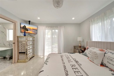 Modern charm meets timeless elegance in this fully renovated 3/2 on Vero Beach Country Club in Florida - for sale on GolfHomes.com, golf home, golf lot