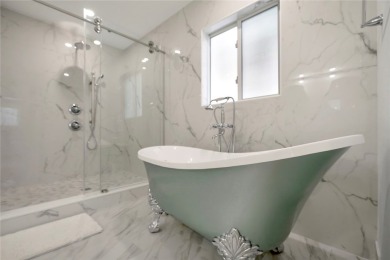 Modern charm meets timeless elegance in this fully renovated 3/2 on Vero Beach Country Club in Florida - for sale on GolfHomes.com, golf home, golf lot