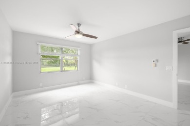 Welcome to this beautifully updated 2/2 unit w/a serene golf on Flamingo Lakes Country Club in Florida - for sale on GolfHomes.com, golf home, golf lot