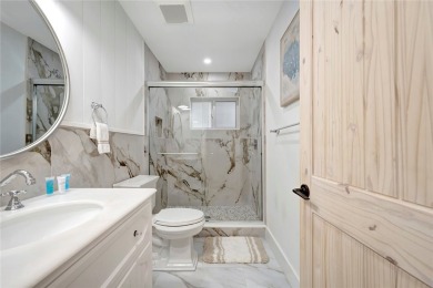 Modern charm meets timeless elegance in this fully renovated 3/2 on Vero Beach Country Club in Florida - for sale on GolfHomes.com, golf home, golf lot