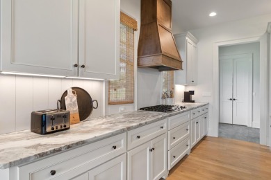 Experience panoramic views of Lake Oconee from this stunning on The Golf Club at Cuscowilla in Georgia - for sale on GolfHomes.com, golf home, golf lot