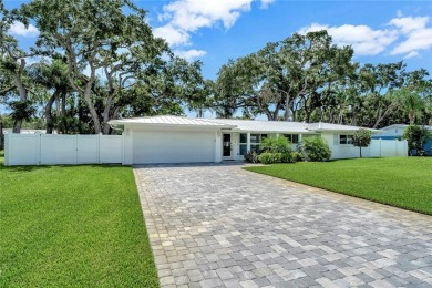 Modern charm meets timeless elegance in this fully renovated 3/2 on Vero Beach Country Club in Florida - for sale on GolfHomes.com, golf home, golf lot