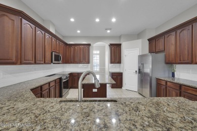 Welcome to this elegant 4-bedroom, 3-bathroom home nestled in on Eagle Landing Golf Club in Florida - for sale on GolfHomes.com, golf home, golf lot