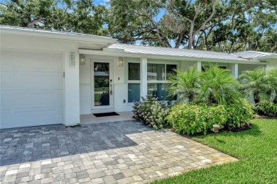 Modern charm meets timeless elegance in this fully renovated 3/2 on Vero Beach Country Club in Florida - for sale on GolfHomes.com, golf home, golf lot