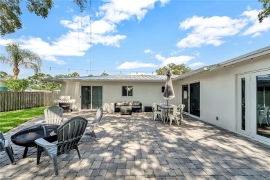 Modern charm meets timeless elegance in this fully renovated 3/2 on Vero Beach Country Club in Florida - for sale on GolfHomes.com, golf home, golf lot