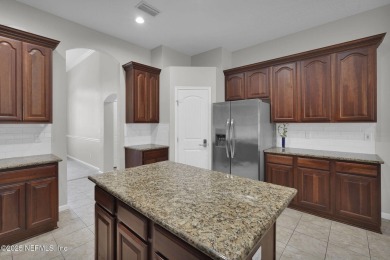 Welcome to this elegant 4-bedroom, 3-bathroom home nestled in on Eagle Landing Golf Club in Florida - for sale on GolfHomes.com, golf home, golf lot
