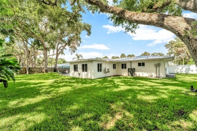 Modern charm meets timeless elegance in this fully renovated 3/2 on Vero Beach Country Club in Florida - for sale on GolfHomes.com, golf home, golf lot