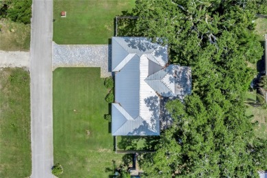 Modern charm meets timeless elegance in this fully renovated 3/2 on Vero Beach Country Club in Florida - for sale on GolfHomes.com, golf home, golf lot