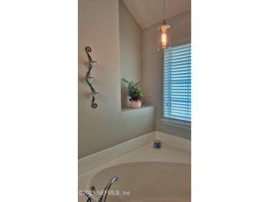 Welcome to this elegant 4-bedroom, 3-bathroom home nestled in on Eagle Landing Golf Club in Florida - for sale on GolfHomes.com, golf home, golf lot