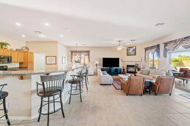 This beautifully maintained residence, located in a desirable on Trilogy Golf Club At Power Ranch in Arizona - for sale on GolfHomes.com, golf home, golf lot