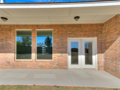 Experience the joy of entertaining your guests in this bright on Golf Club At Surrey Hills in Oklahoma - for sale on GolfHomes.com, golf home, golf lot