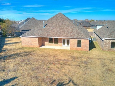 Experience the joy of entertaining your guests in this bright on Golf Club At Surrey Hills in Oklahoma - for sale on GolfHomes.com, golf home, golf lot